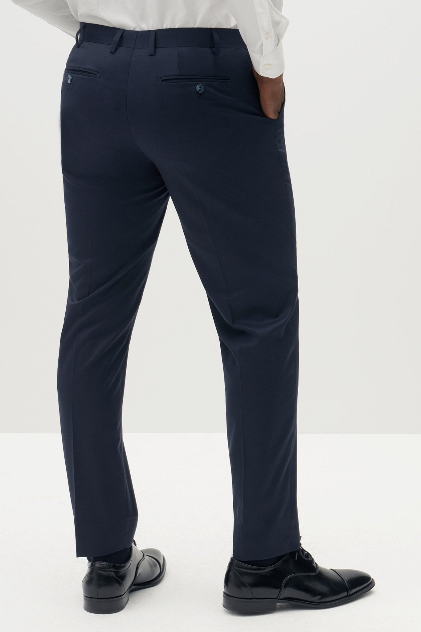 Navy Blue Groomsmen Suit by SuitShop, back view