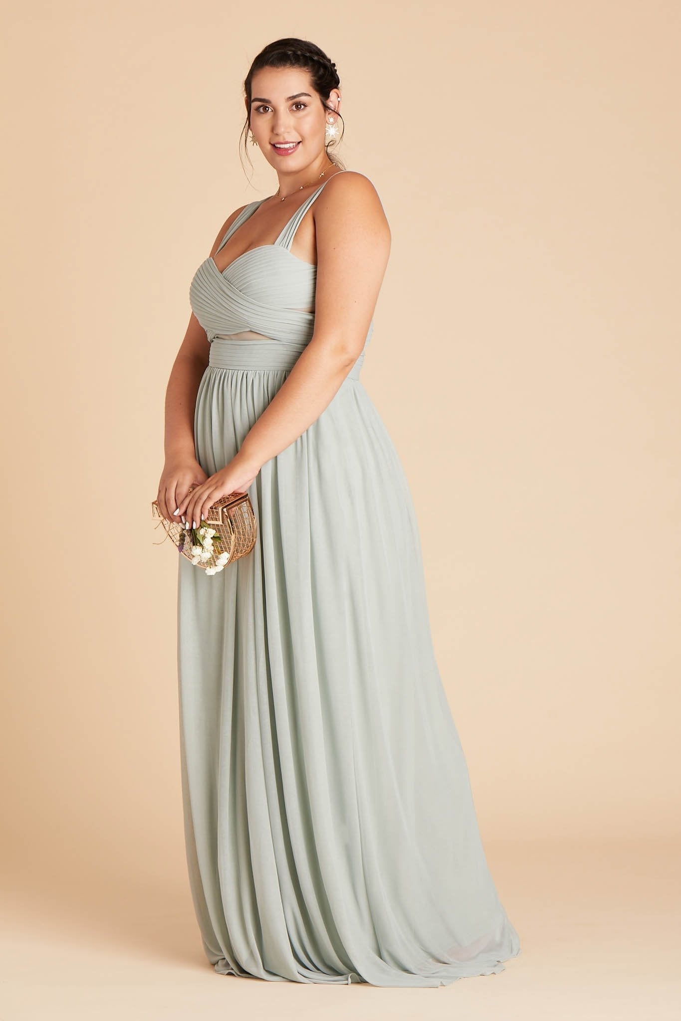 Side view model wearing Elsye Plus Size Bridesmaid Dress in sage mesh paired with the Brighton Pearl Necklace by Birdy Grey.