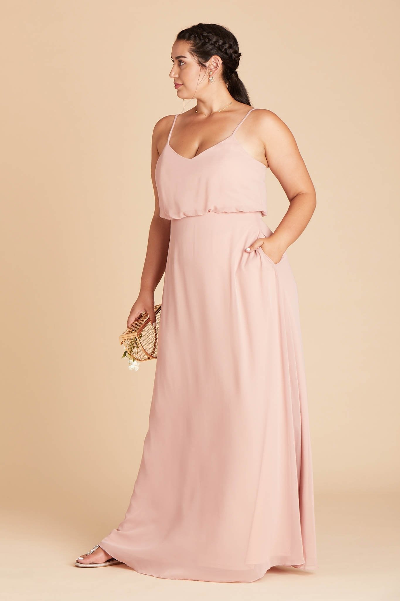 Gwennie plus size bridesmaid dress in dusty rose chiffon by Birdy Grey, front view with hand in pocket