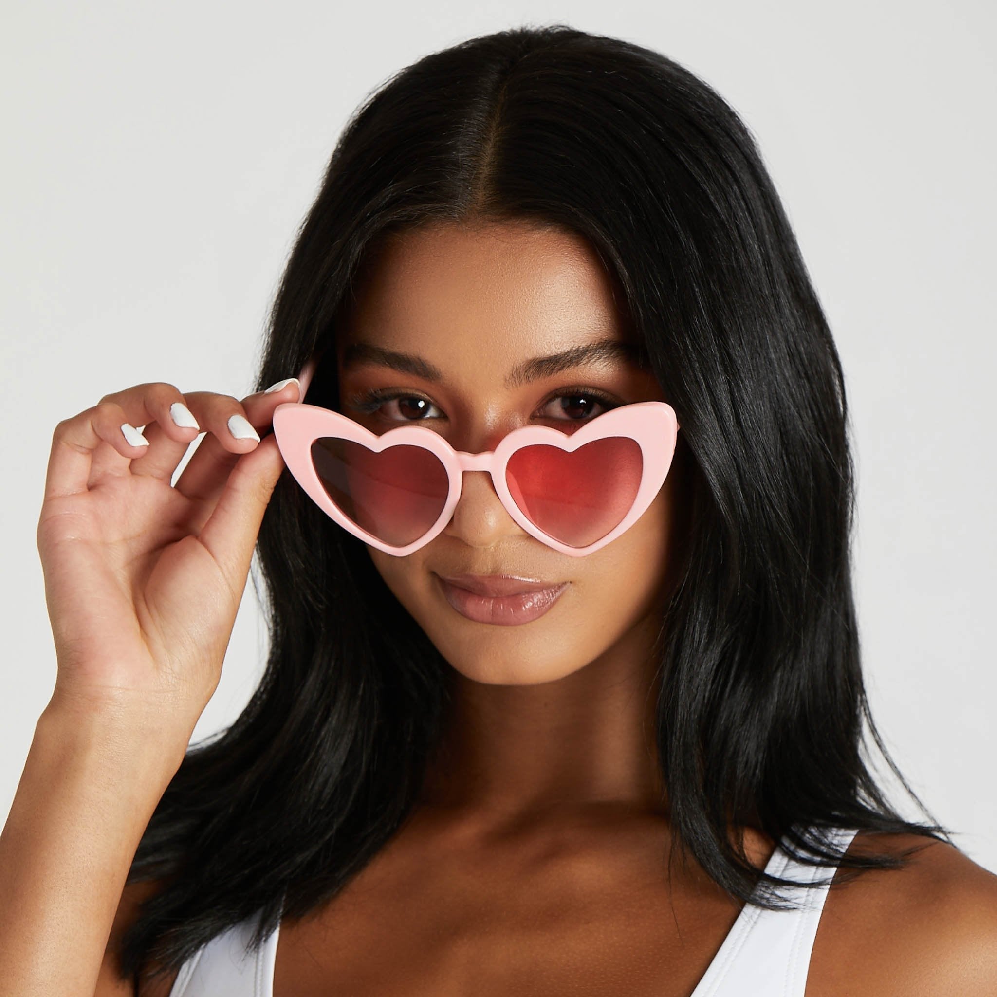 Heart sunglasses in pink by Birdy Grey, front view