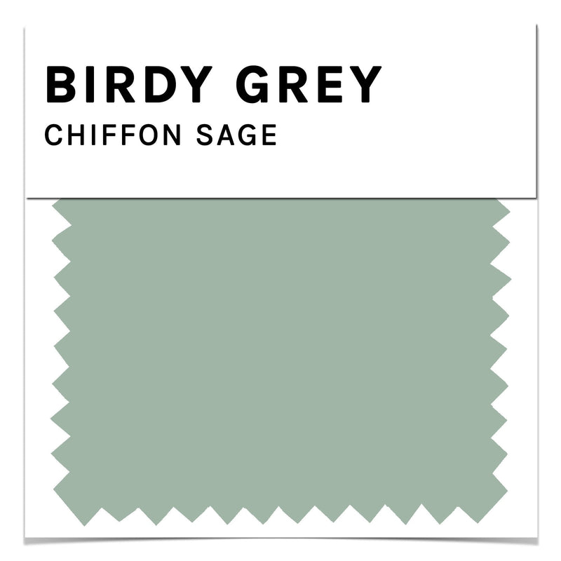 Front closeup view of the Birdy Grey color swatch card for chiffon fabric in sage. The sage color is a light green.