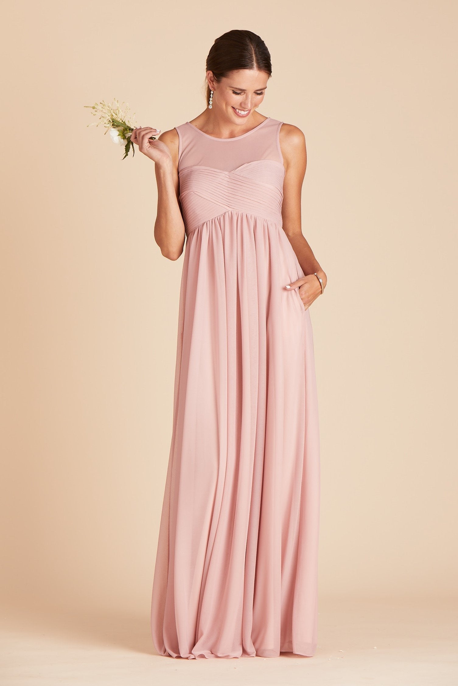 Ryan bridesmaid dress in dusty rose pink chiffon by Birdy Grey, front view with hand in pocket 