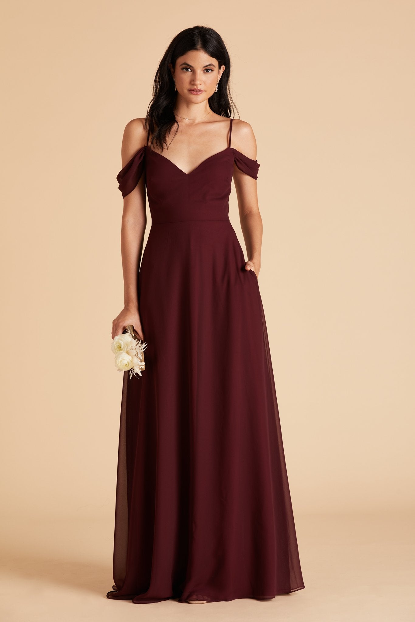 Devin convertible bridesmaid dress with slit in cabernet burgundy chiffon by Birdy Grey, front view with hand in pocket