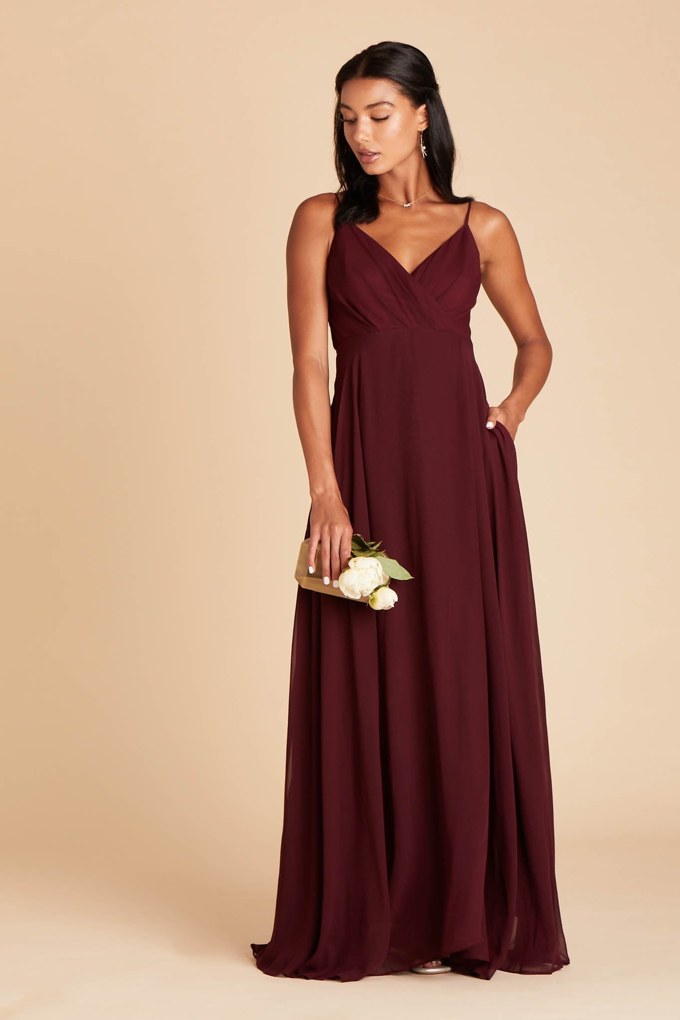 Kaia bridesmaids dress in cabernet burgundy chiffon by Birdy Grey, front view with hand in pocket