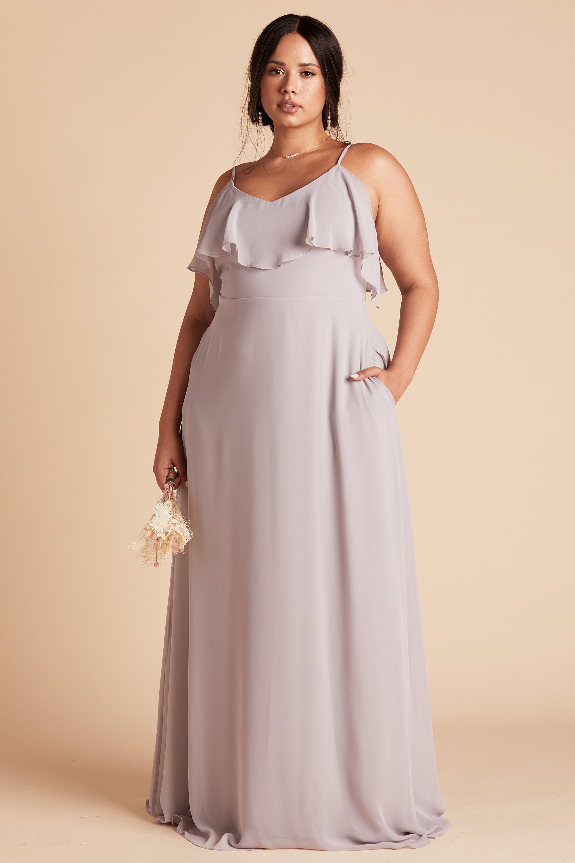 Jane convertible plus size bridesmaid dress in lilac purple chiffon by Birdy Grey, front view with hand in pocket