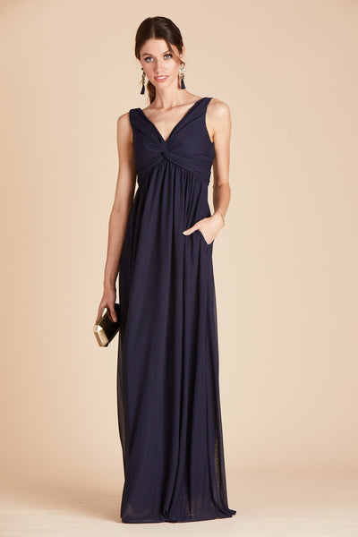 Lianna bridesmaid dress in navy blue chiffon by Birdy Grey, front view with hand in pocket