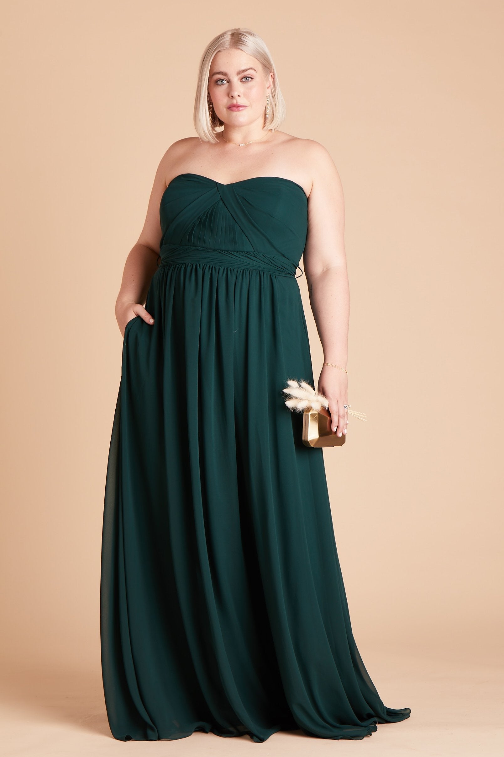 Front view of the floor-length Grace Convertible Plus Size Bridesmaid Dress in emerald chiffon paired with the Brookhaven Pearl Trio Necklace by Birdy Grey.