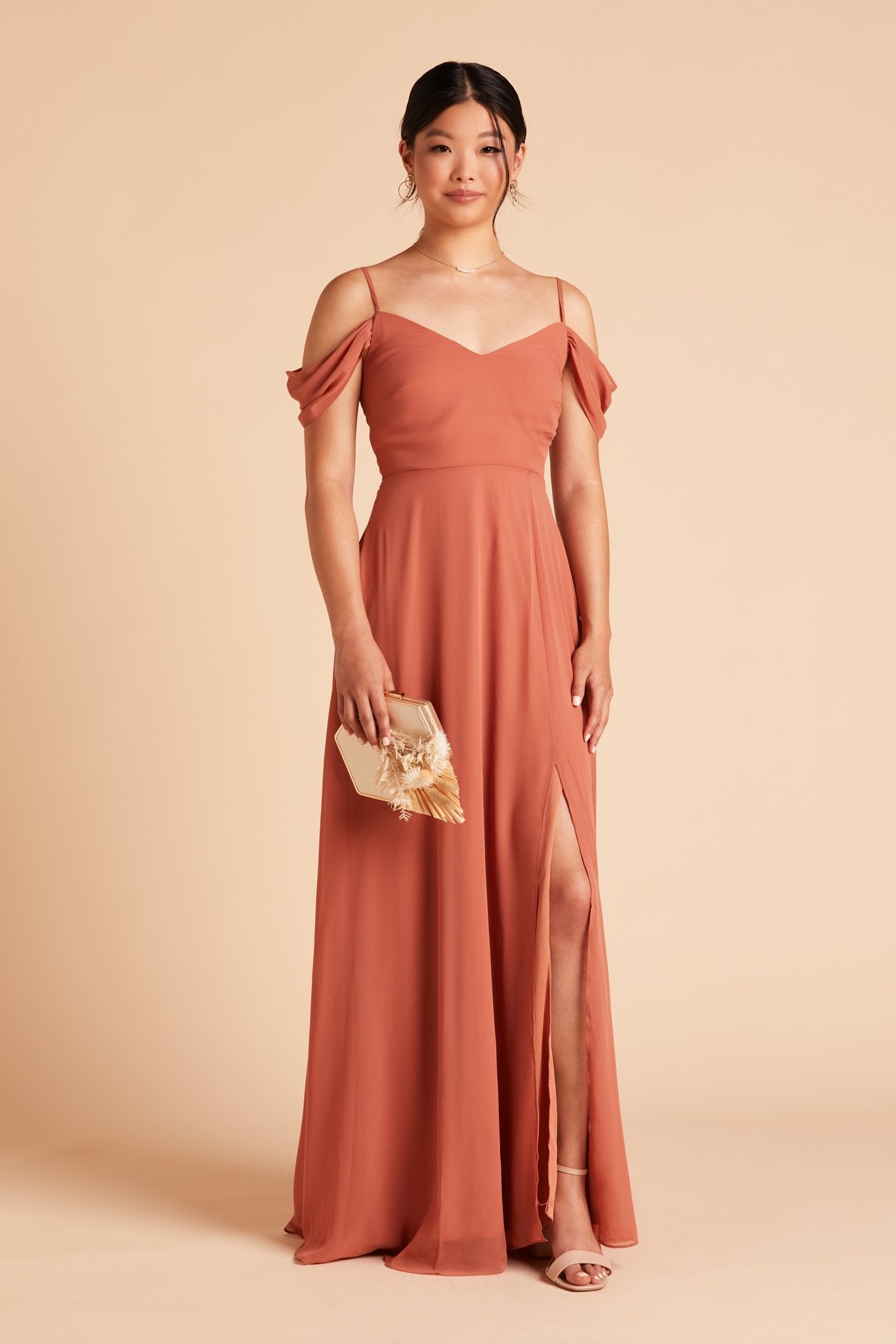 Front view of the floor-length Devin Convertible Bridesmaid Dress in terracotta chiffon reveals a fitted bust and flowing full-length skirt.