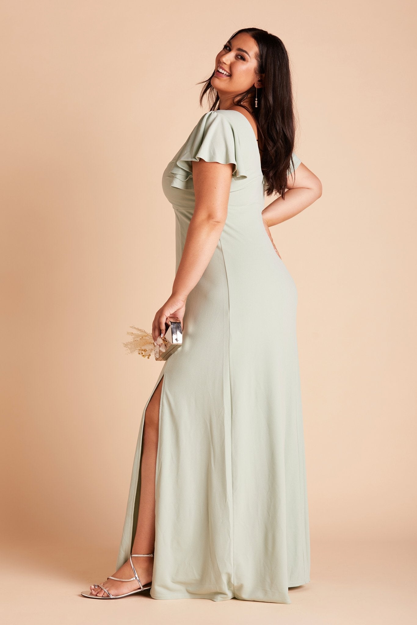 Hannah plus size bridesmaid dress with slit in sage green crepe by Birdy Grey, side view