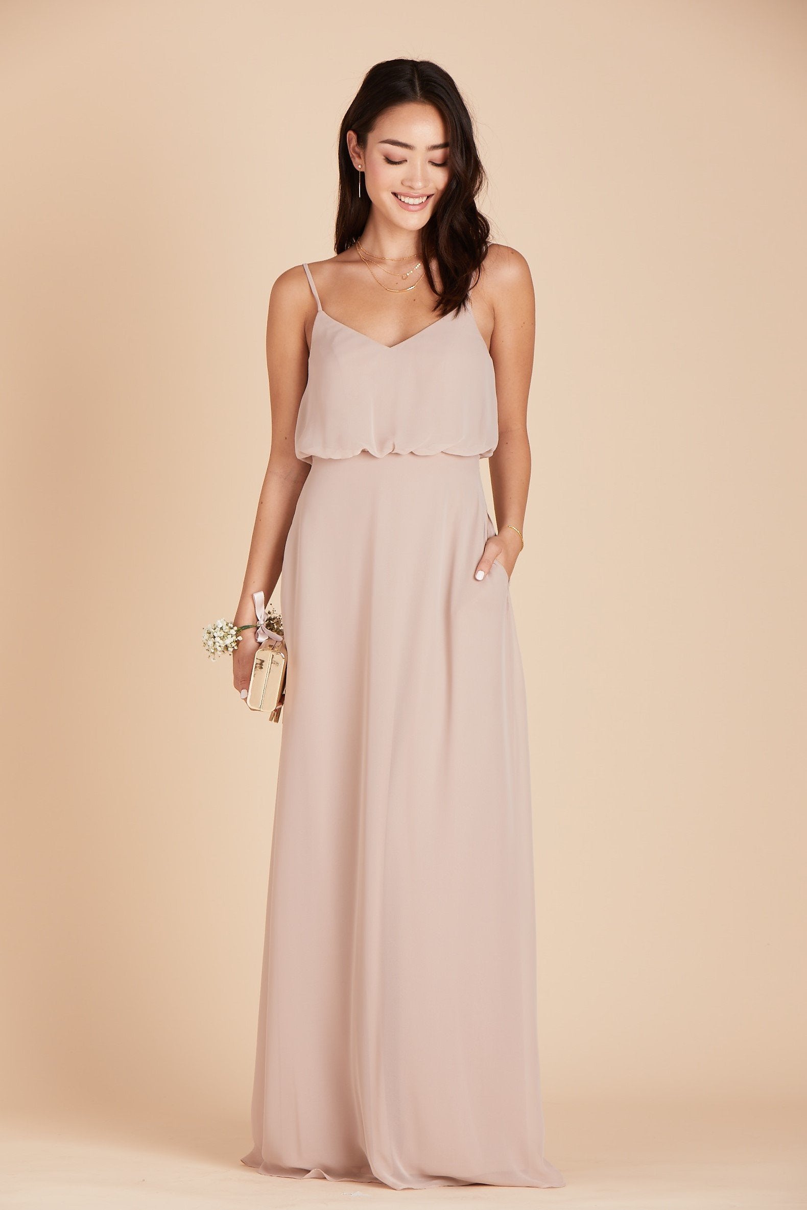 Gwennie bridesmaid dress in taupe chiffon by Birdy Grey, front view with hand in pocket