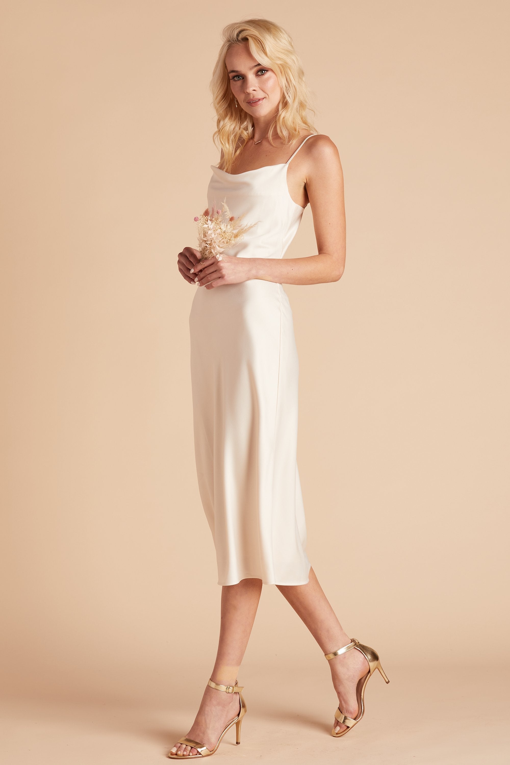 Lisa midi dress in champagne satin by Birdy Grey, side view