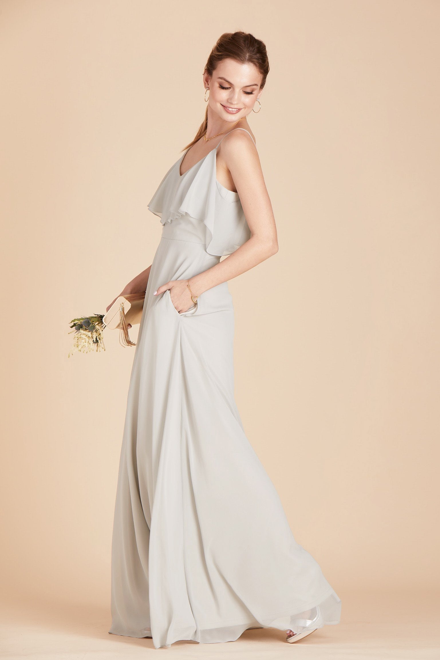 Jane convertible bridesmaid dress in dove gray chiffon by Birdy Grey, side view with hand in pocket