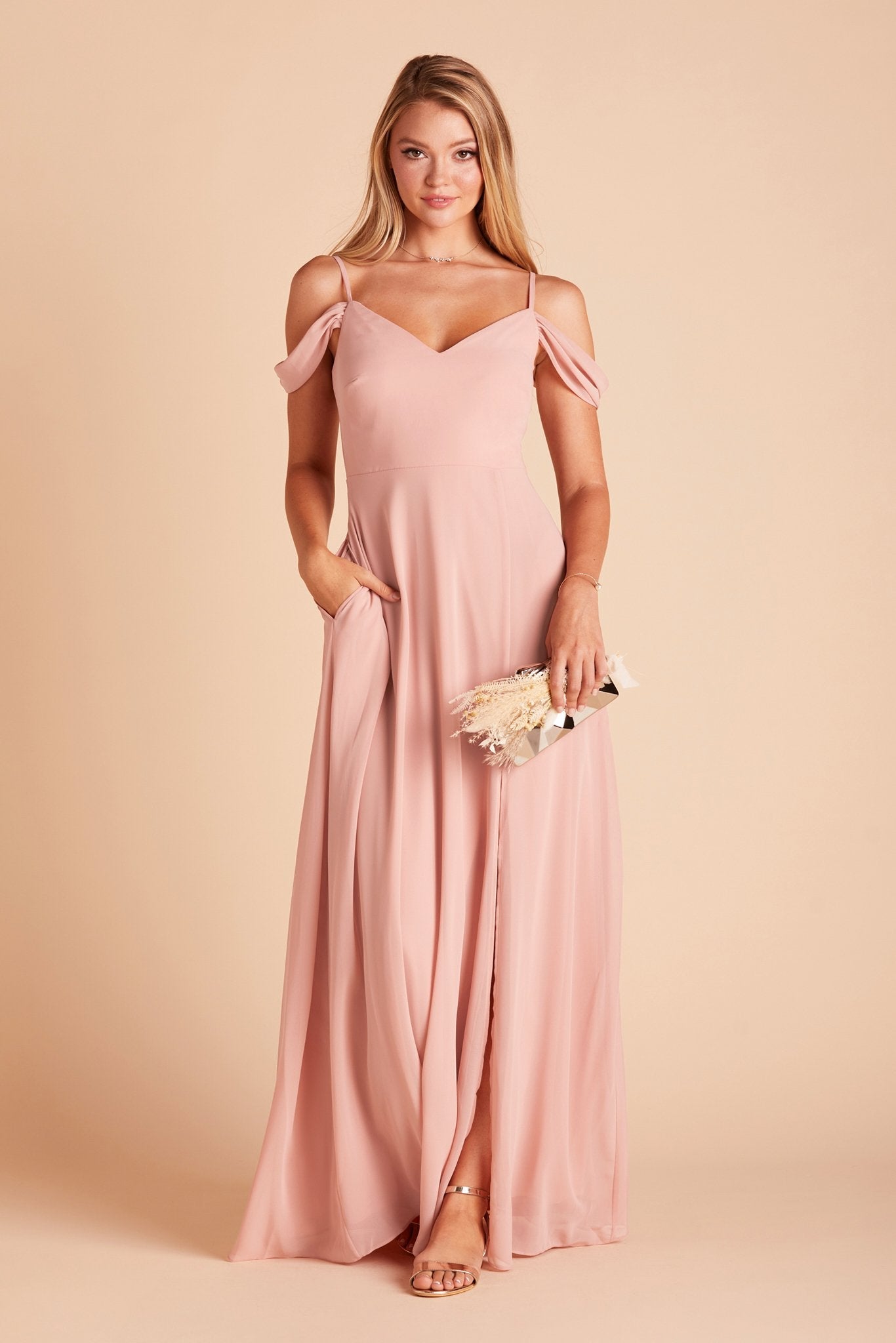 Devin convertible bridesmaids dress with slit in dusty rose chiffon by Birdy Grey, front view with hand in pocket