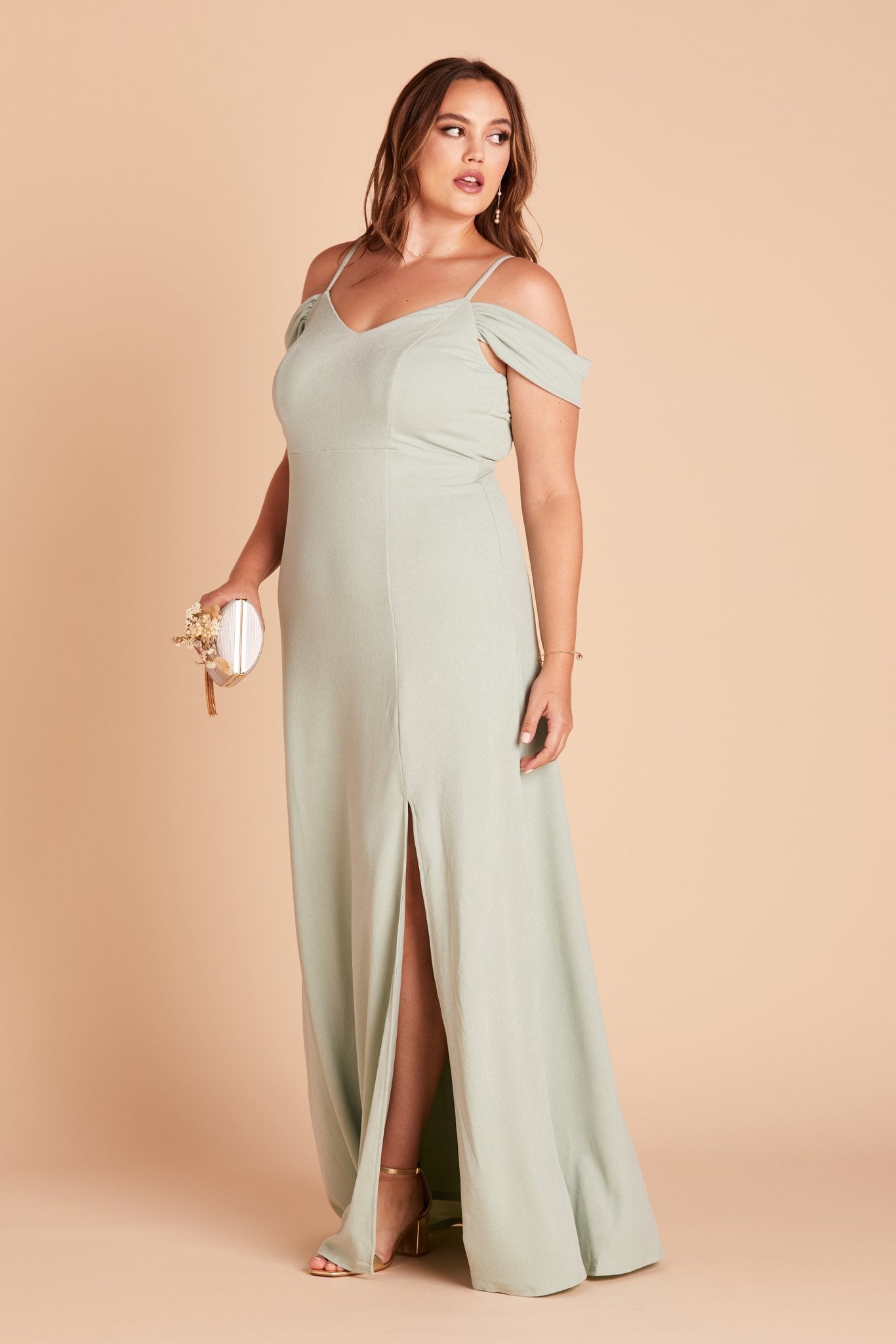 Dev plus size bridesmaid dress with slit in sage green crepe by Birdy Grey, side view