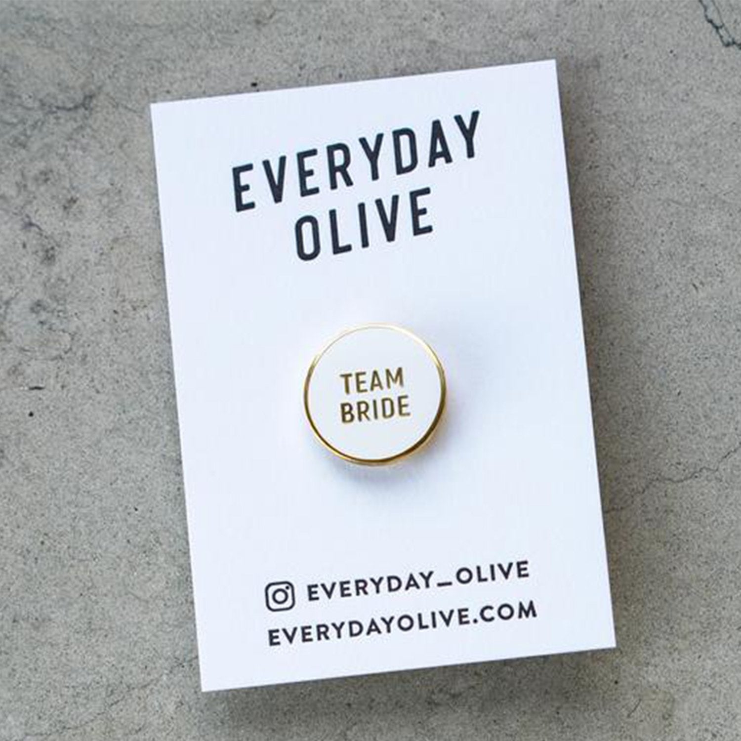 Team Bride Enamel Pin in white and gold by Birdy Grey, front view