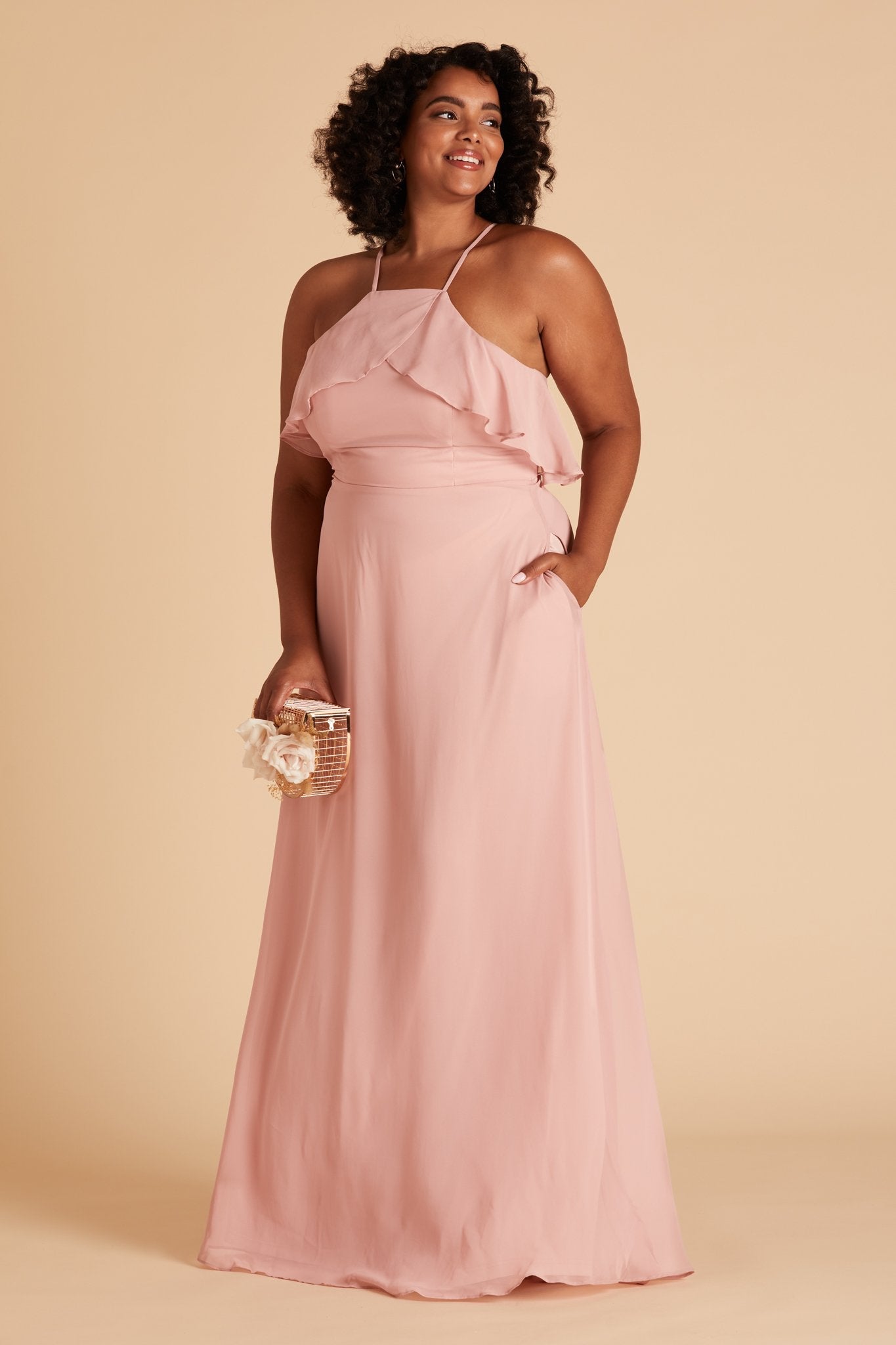 Jules plus size bridesmaid dress in dusty rose chiffon by Birdy Grey, front view with hand in pocket