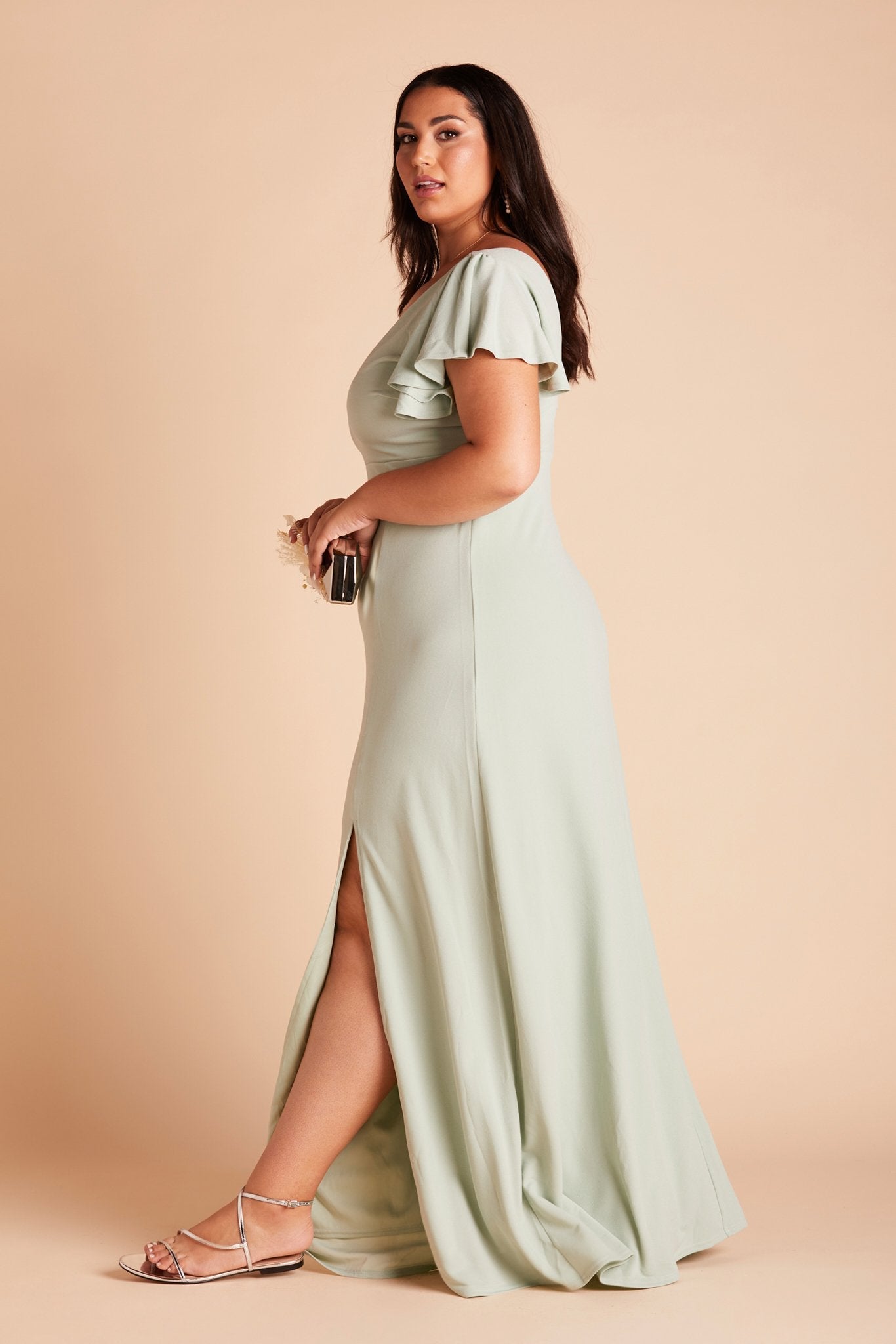 Hannah plus size bridesmaid dress with slit in sage green crepe by Birdy Grey, side view