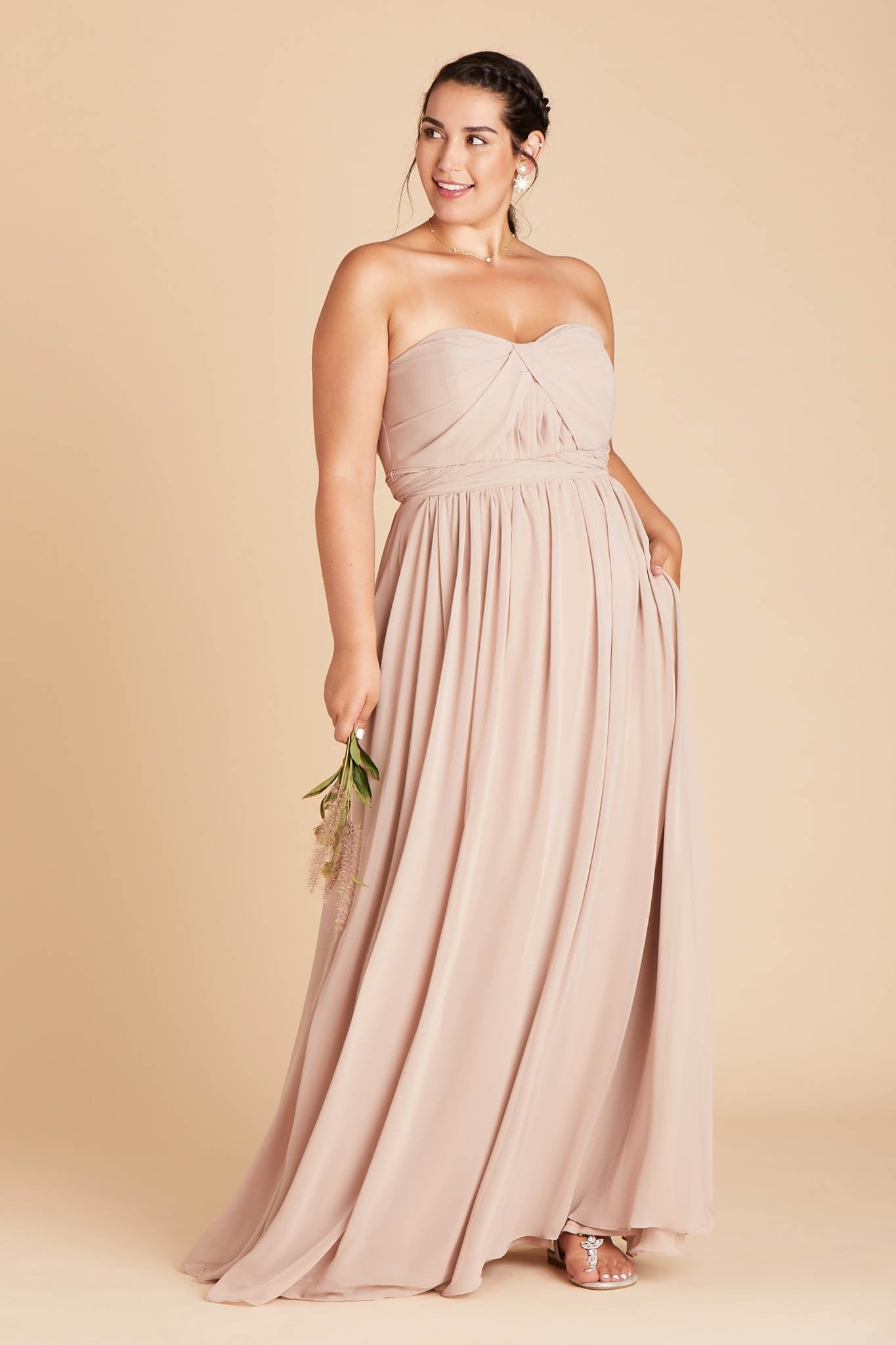 Grace convertible plus size bridesmaid dress in taupe chiffon by Birdy Grey, front view with hand in pocket