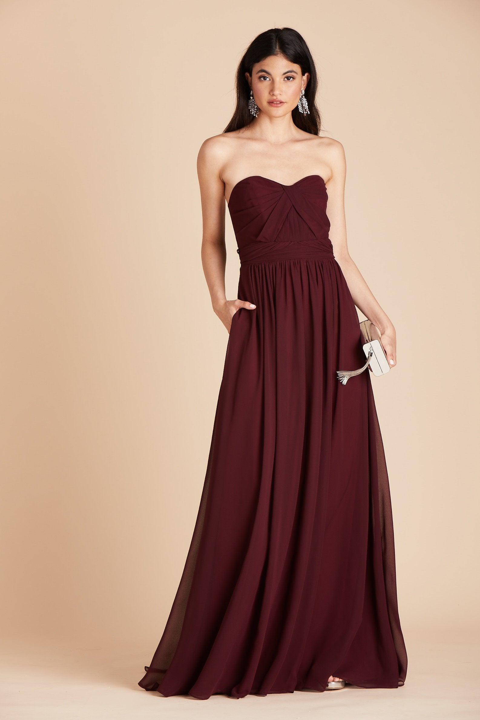 Grace convertible bridesmaid dress in cabernet burgundy chiffon by Birdy Grey, front view with hand in pocket