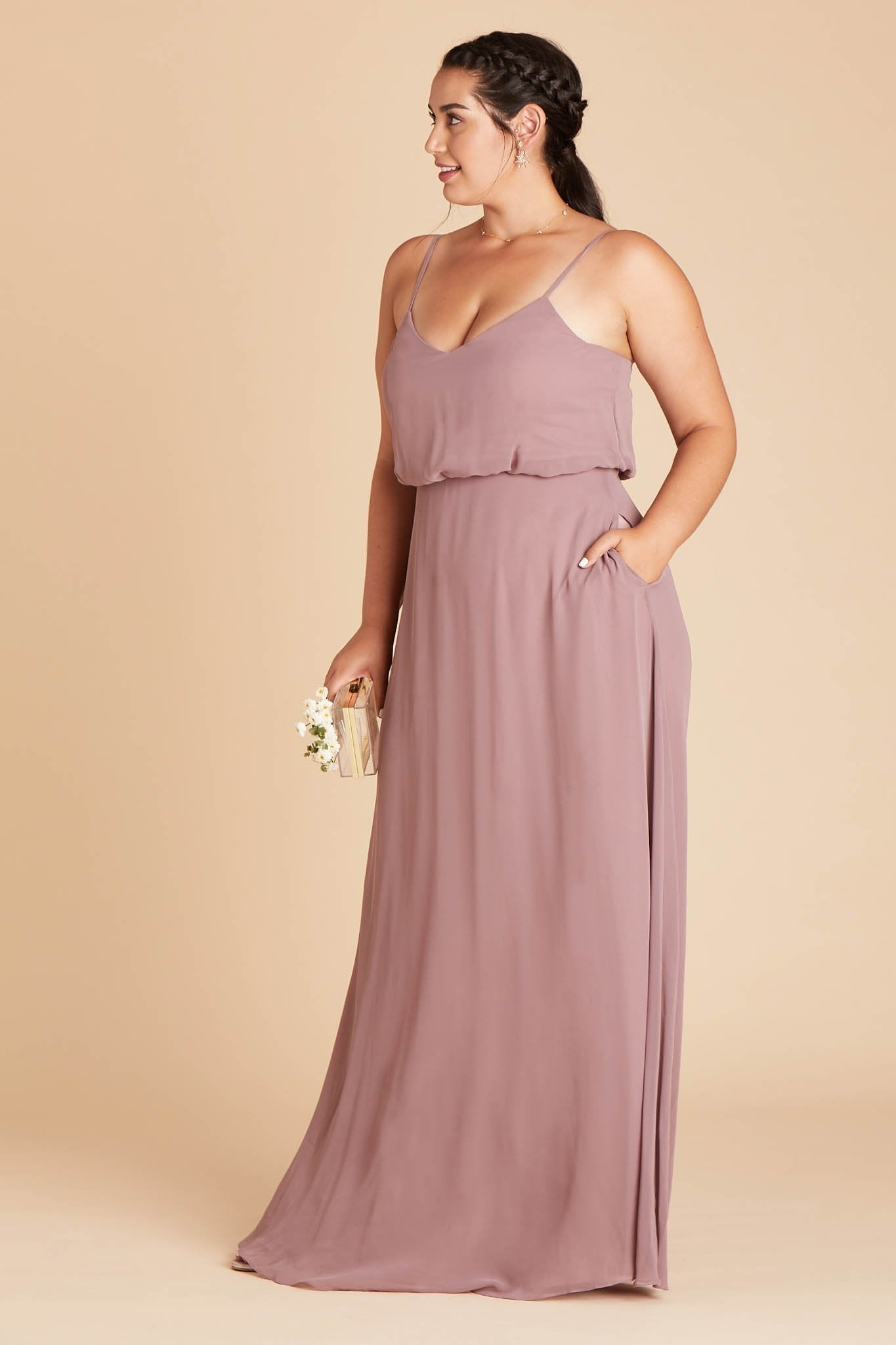 Gwennie plus size bridesmaid dress in dark mauve chiffon by Birdy Grey, side view with hand in pocket