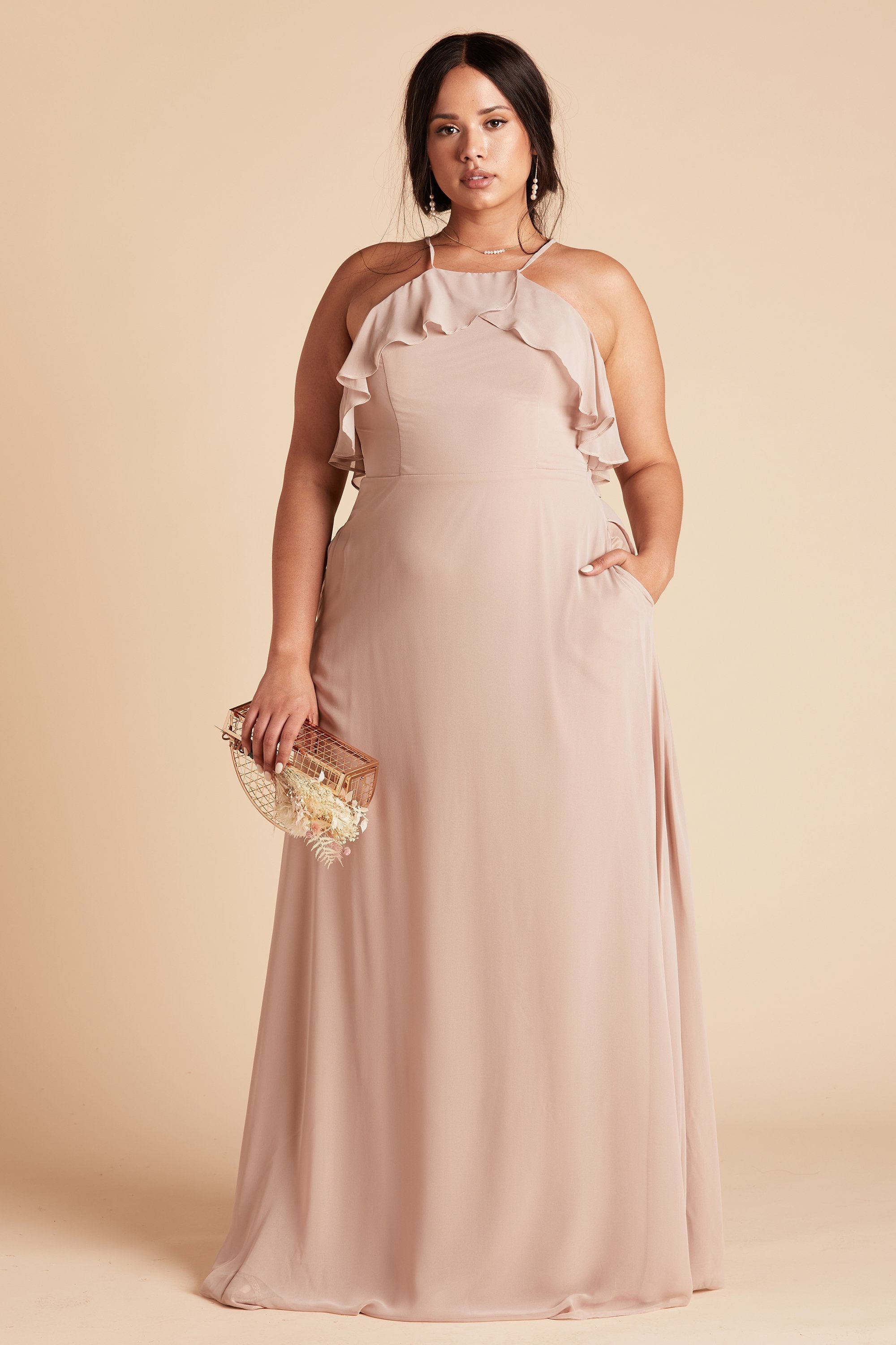 Jules plus size bridesmaid dress in taupe chiffon by Birdy Grey, front view with hand in pocket