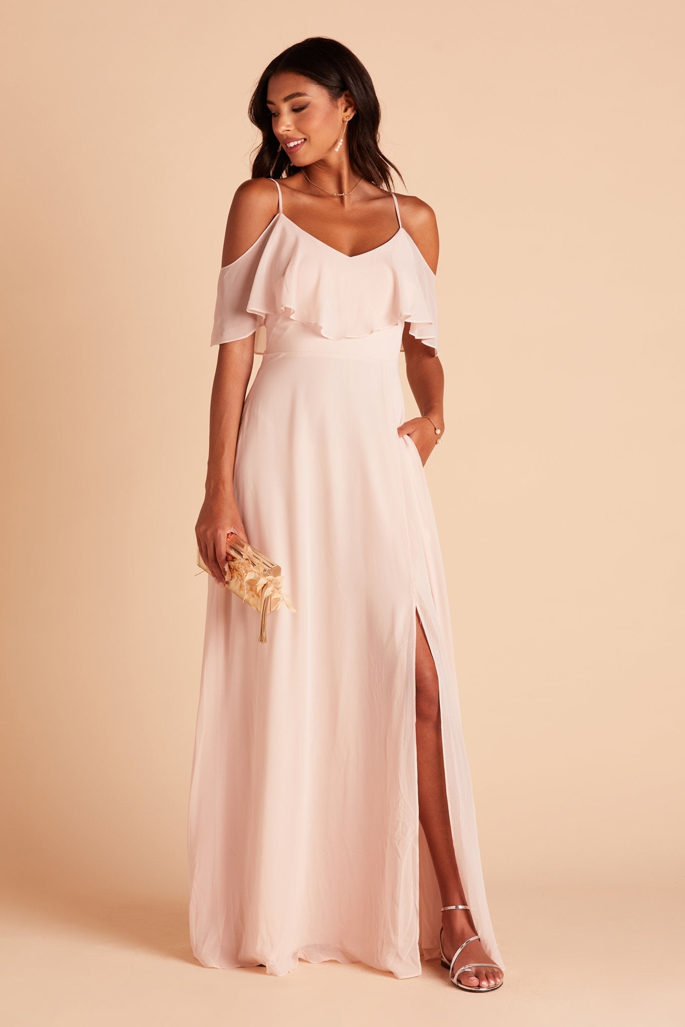 Jane convertible bridesmaid dress with slit in pale blush chiffon by Birdy Grey, front view with hand in pocket