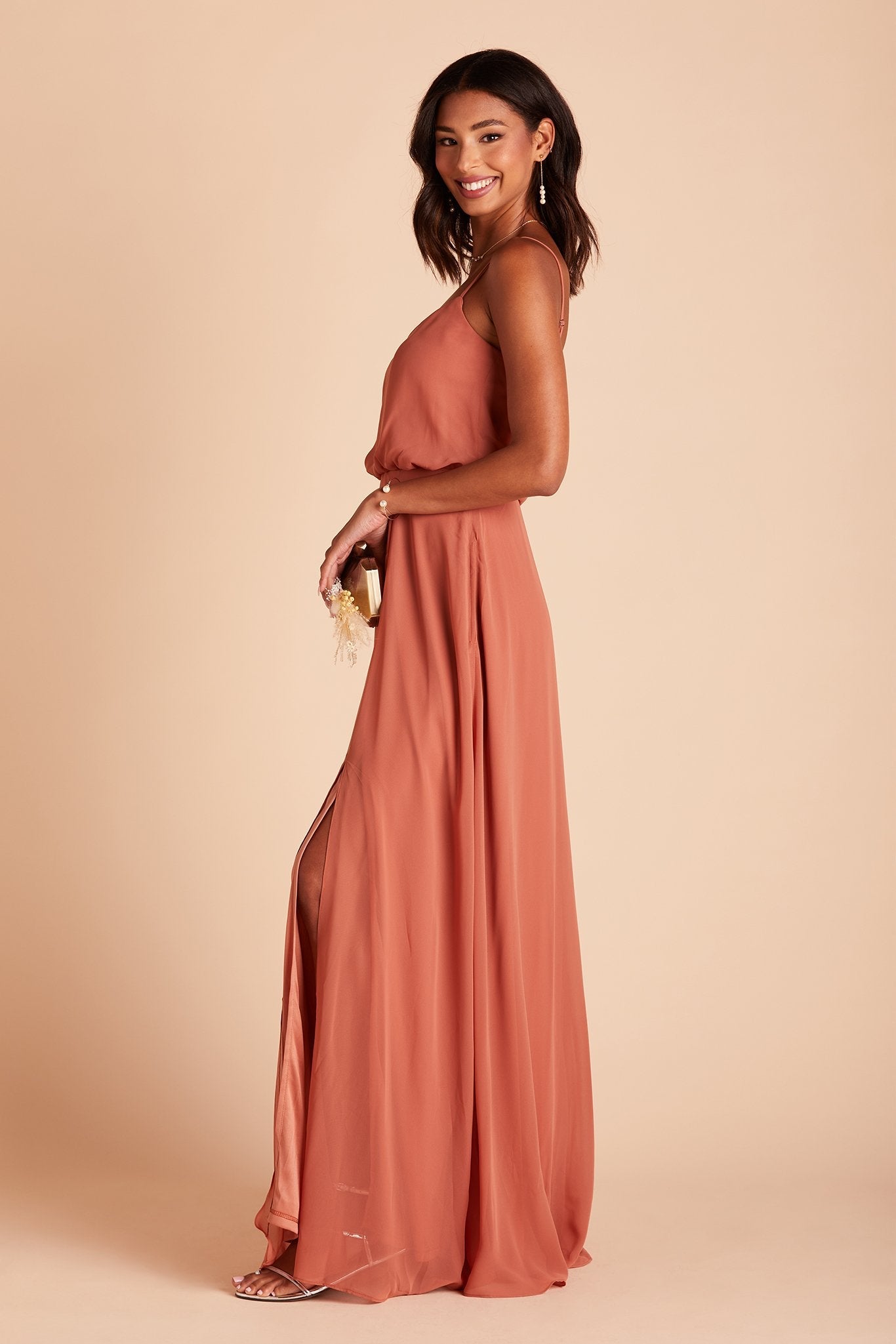 Gwennie bridesmaid dress with slit in terracotta chiffon by Birdy Grey, side view