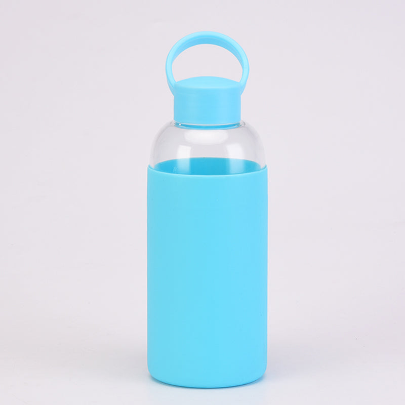 Reusable Glass Water Bottle with a blue cap and blue silicone sleeve drinkware by Birdy Grey, front view