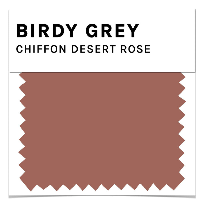 Front closeup view of the Birdy Grey color swatch card for chiffon fabric in desert rose. The desert rose color is a medium brownish pink.