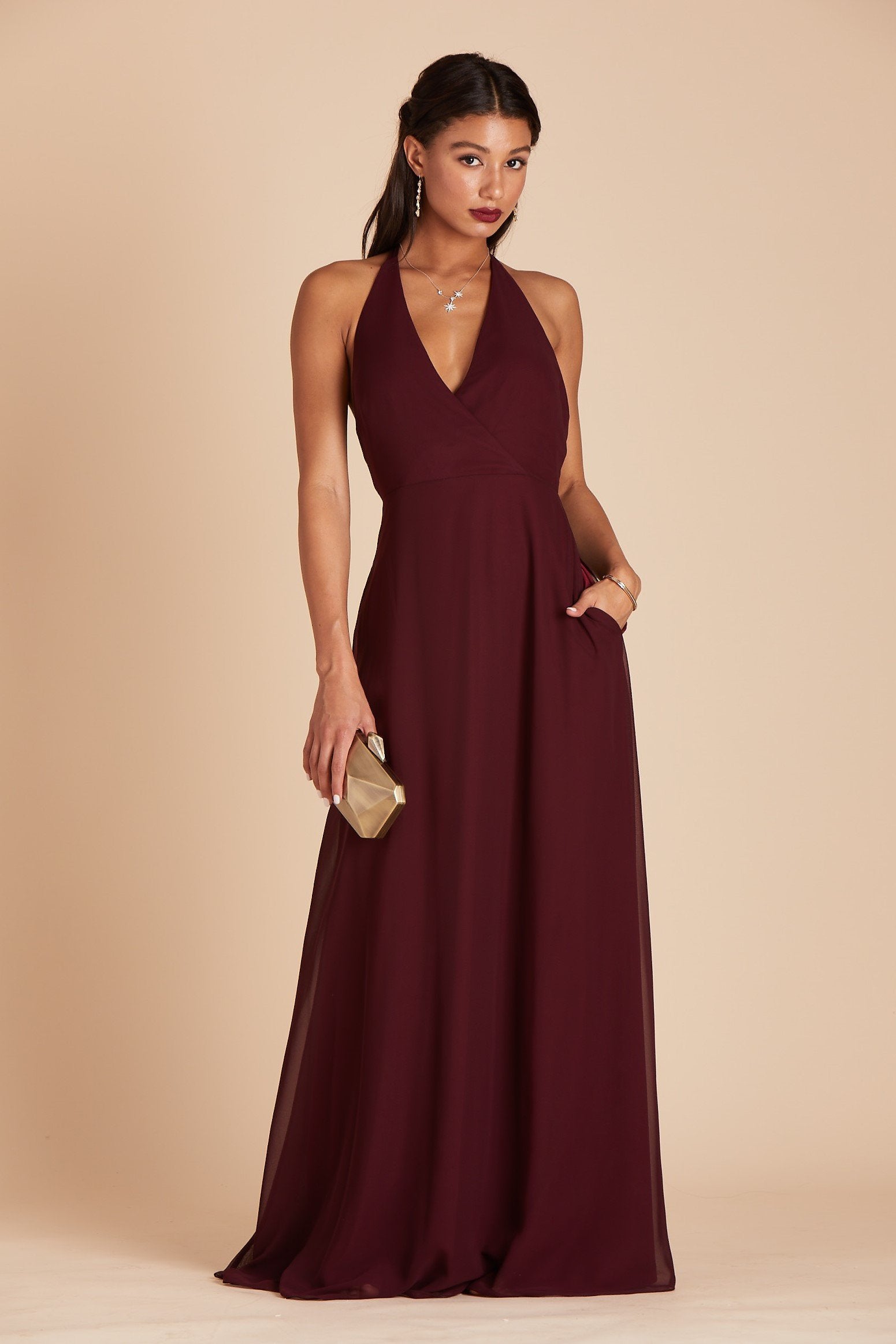 Moni convertible bridesmaids dress in cabernet burgundy chiffon by Birdy Grey, front view with hand in pocket