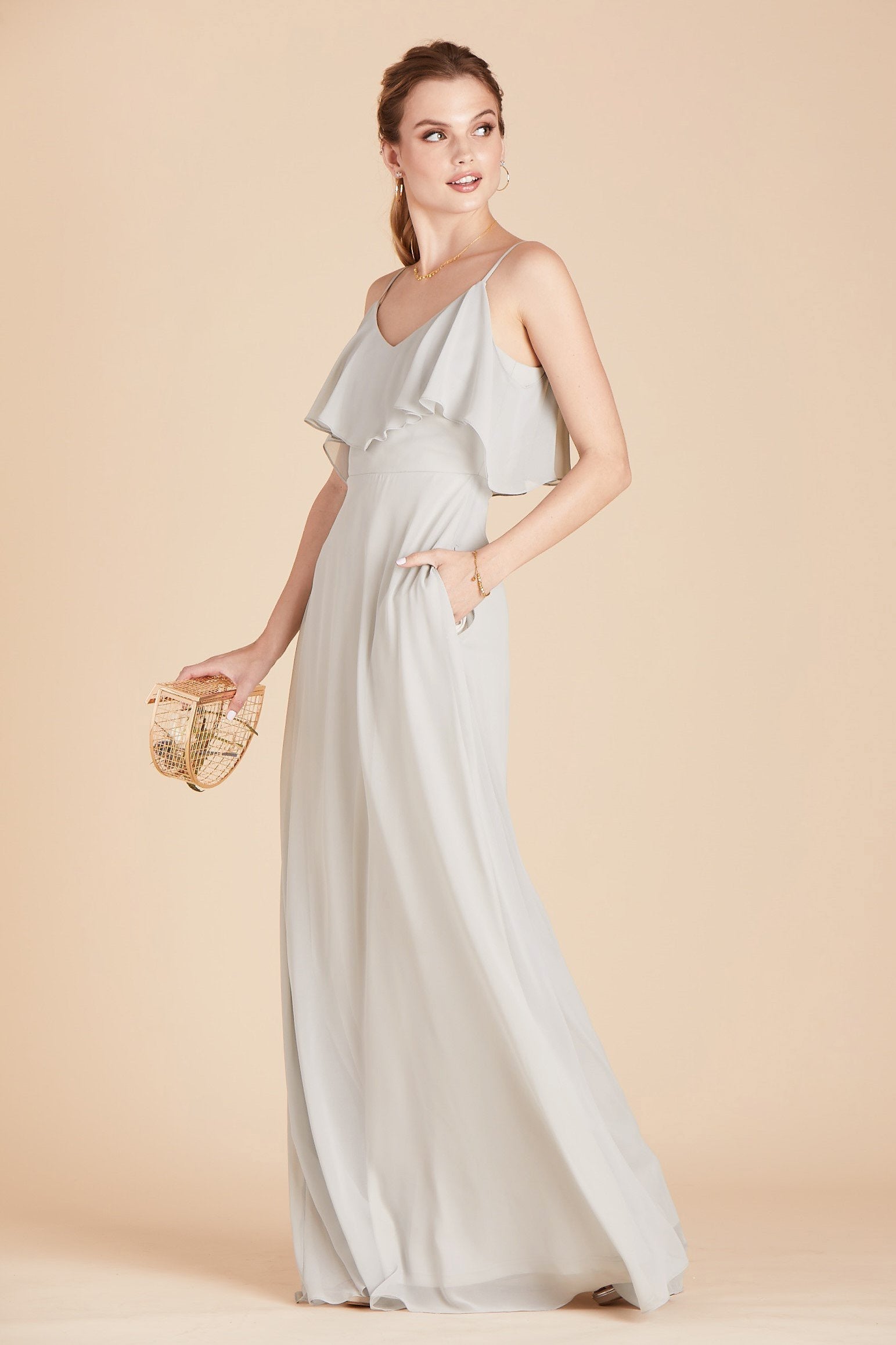 Jane convertible bridesmaid dress in dove gray chiffon by Birdy Grey, side view with hand in pocket