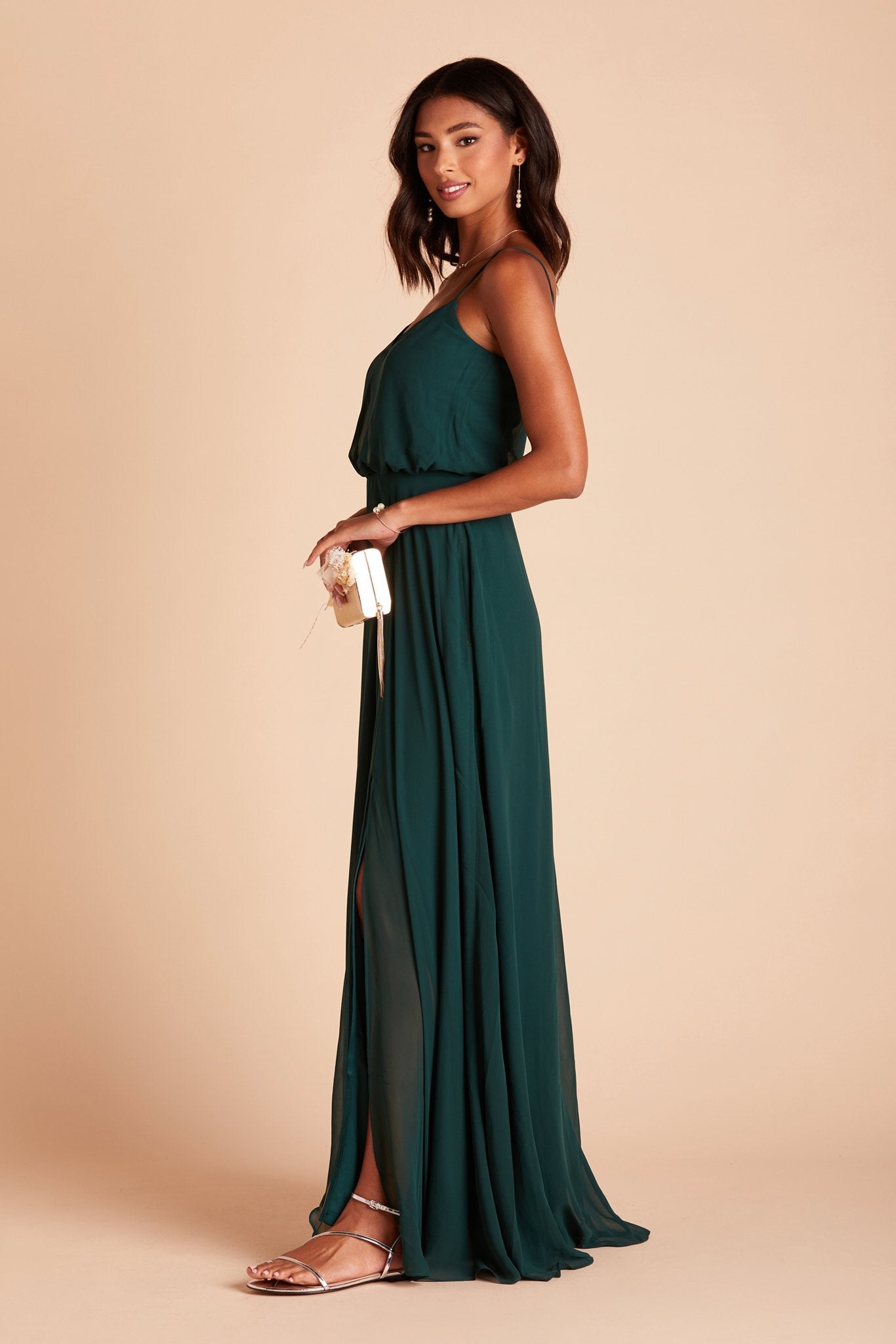 Gwennie bridesmaid dress with slit in emerald green chiffon by Birdy Grey, side view