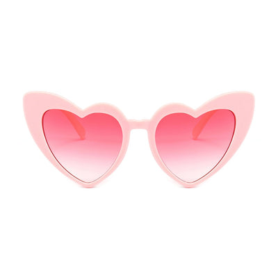 Heart sunglasses in pink by Birdy Grey, front view