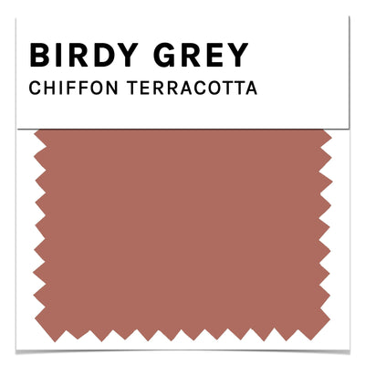 Front closeup view of the Birdy Grey color swatch card for terracotta chiffon. The terracotta color is a medium reddish brown color.