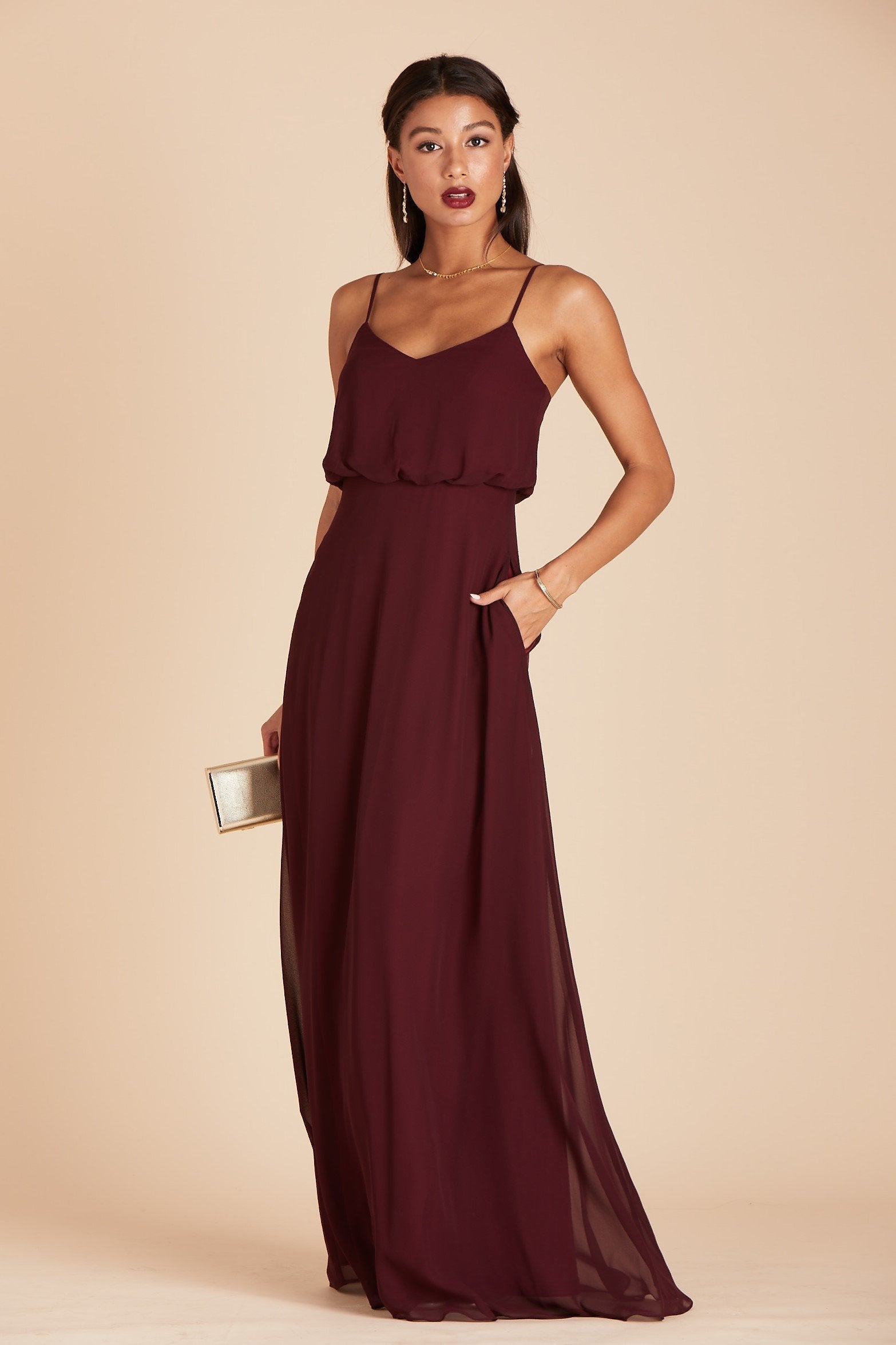 Gwennie bridesmaid dress in cabernet burgundy chiffon by Birdy Grey, front view with hand in pocket