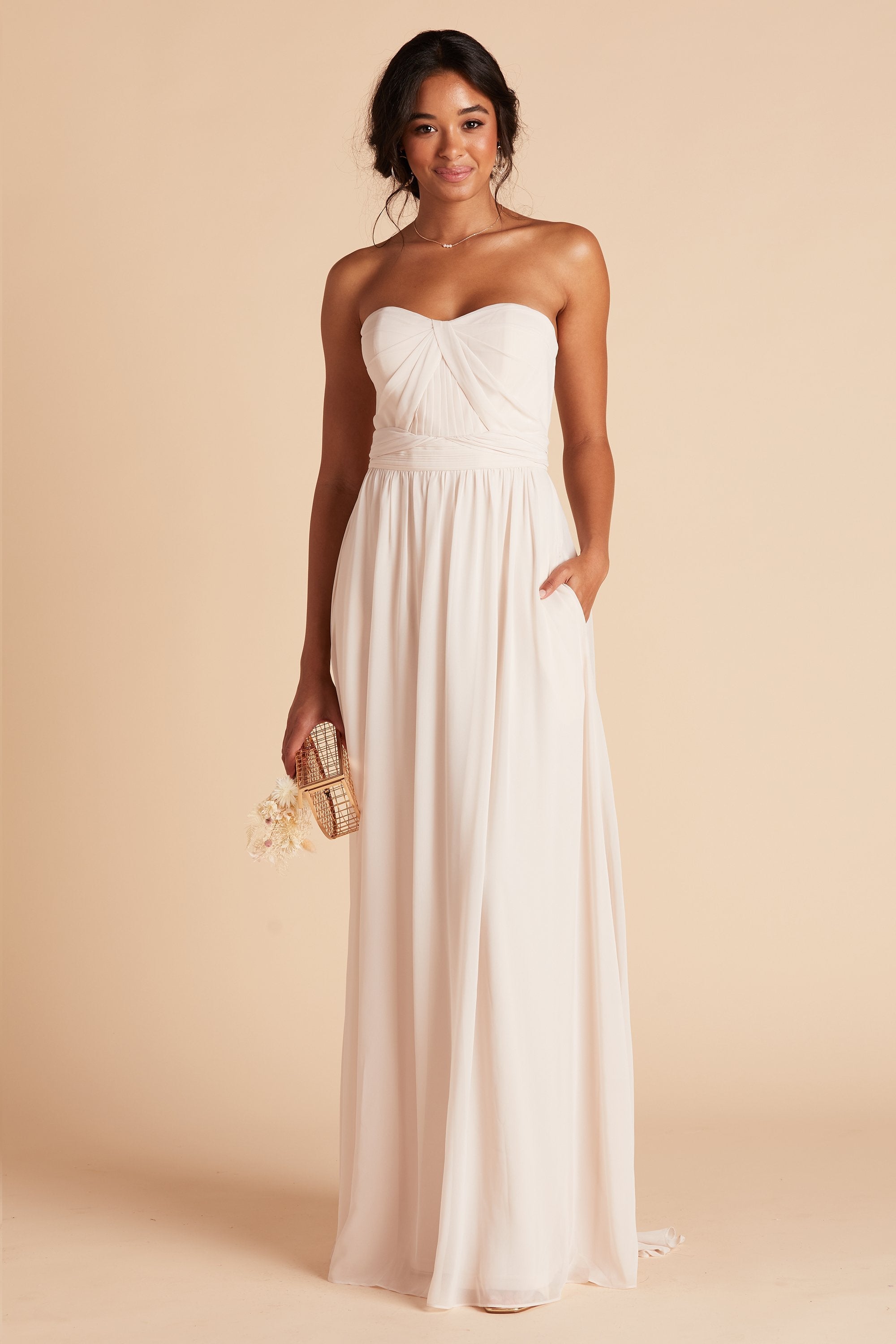 Grace convertible bridesmaid dress in champaign chiffon by Birdy Grey, front view with hand in pocket