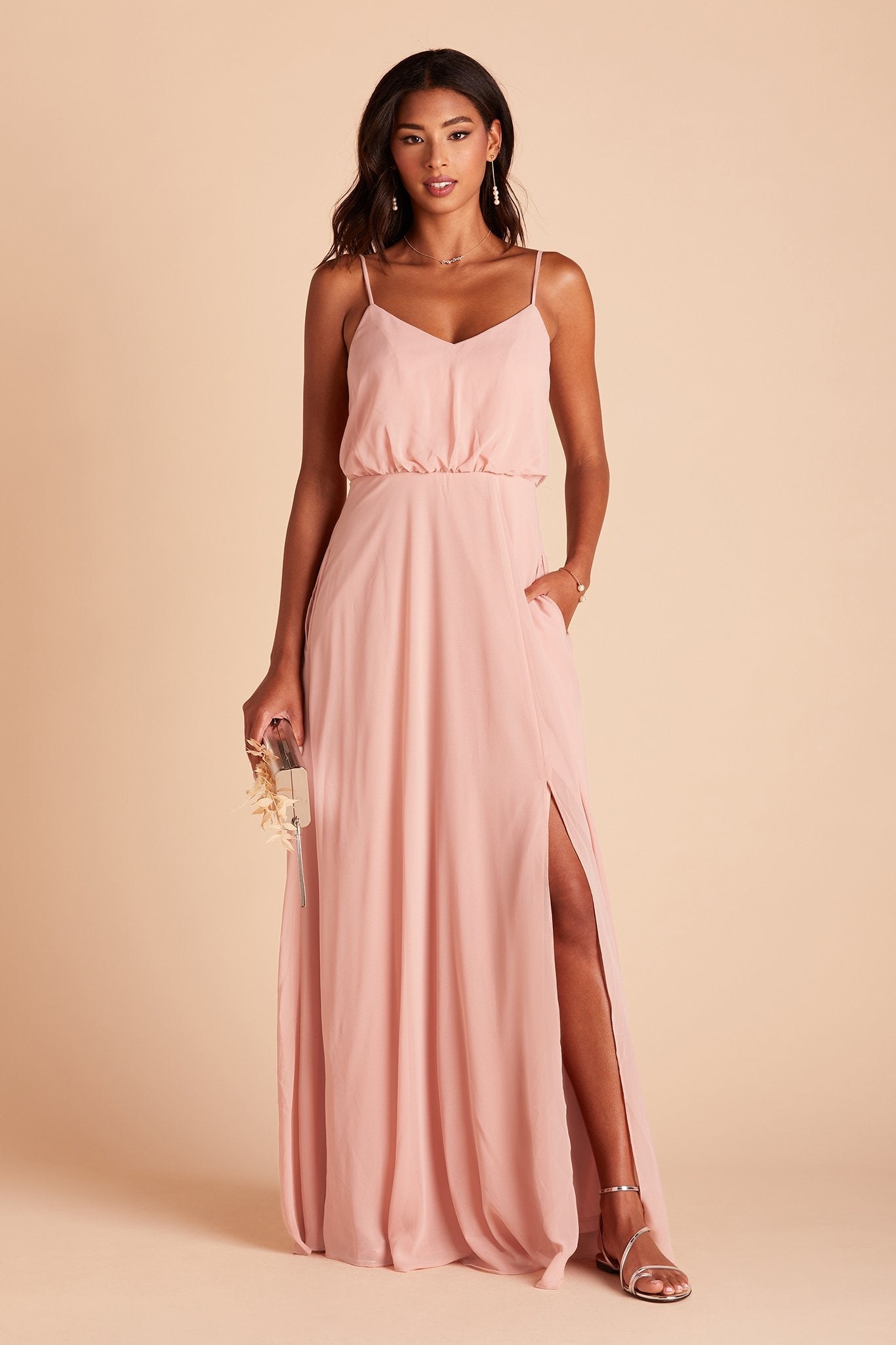 Gwennie bridesmaid dress with slit in dusty rose chiffon by Birdy Grey, front view with hand in pocket