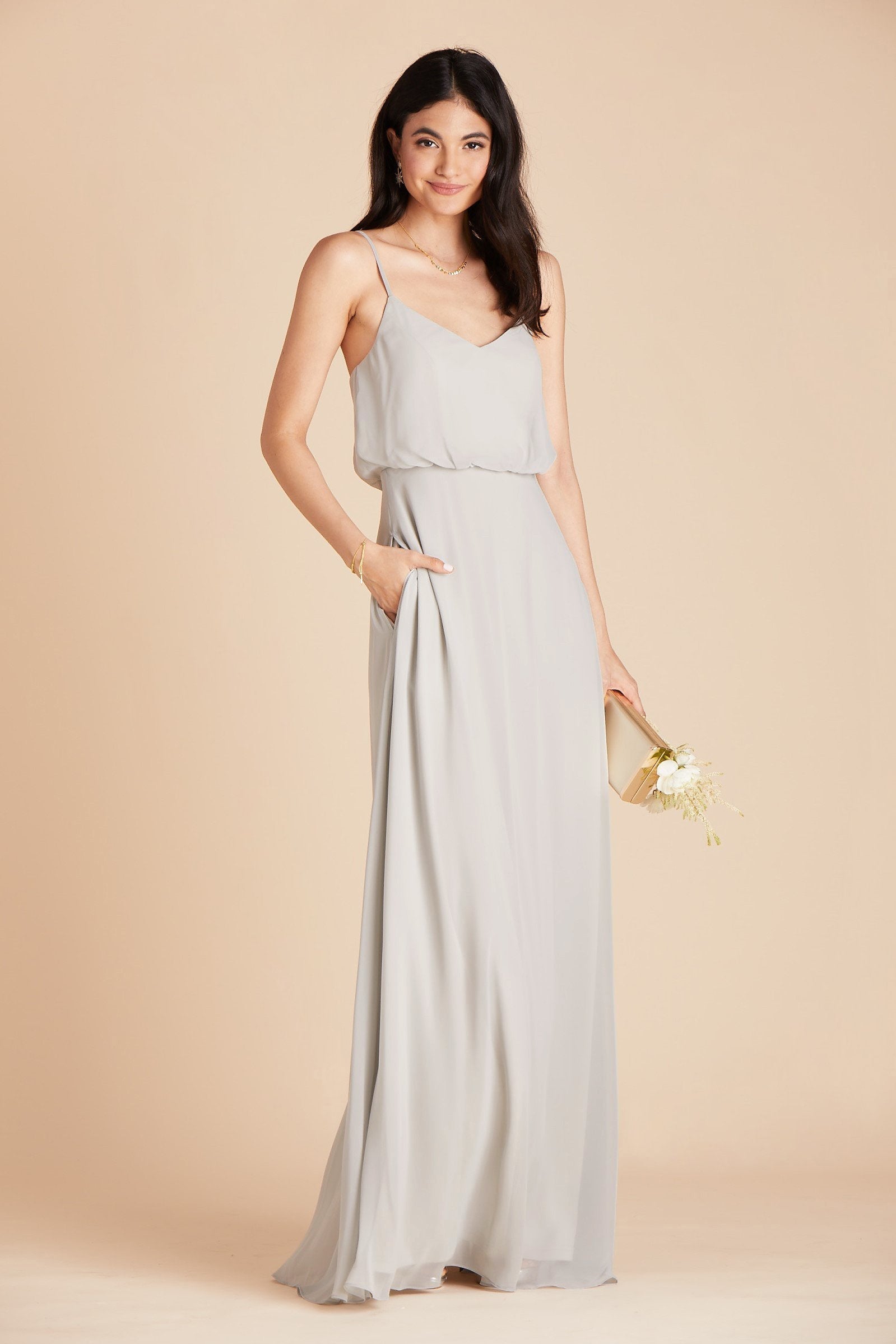 Gwennie bridesmaid dress in dove gray chiffon by Birdy Grey, front view with hand in pocket