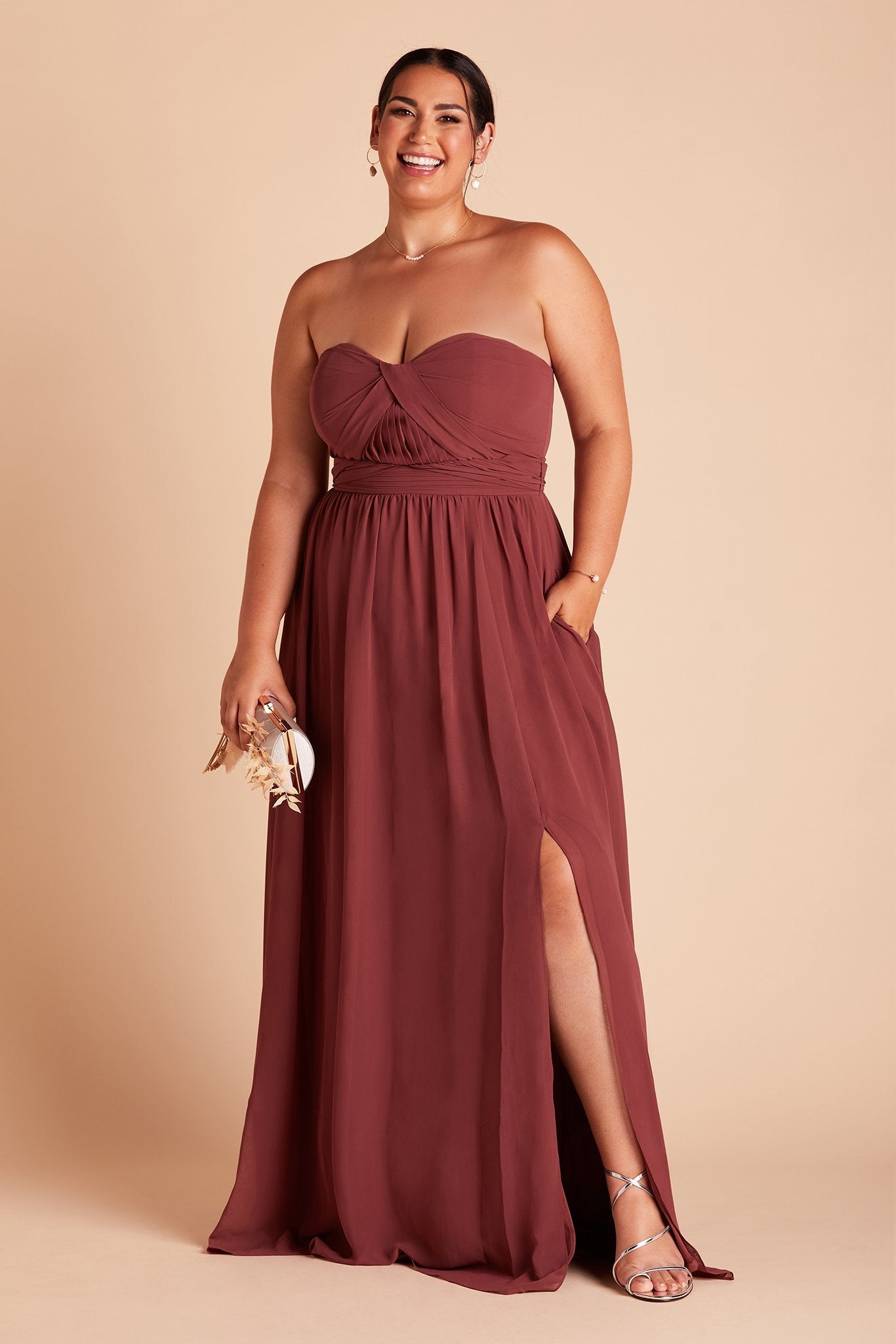 Grace convertible plus size bridesmaid dress with slit in rosewood chiffon by Birdy Grey, front view with hand in pocket