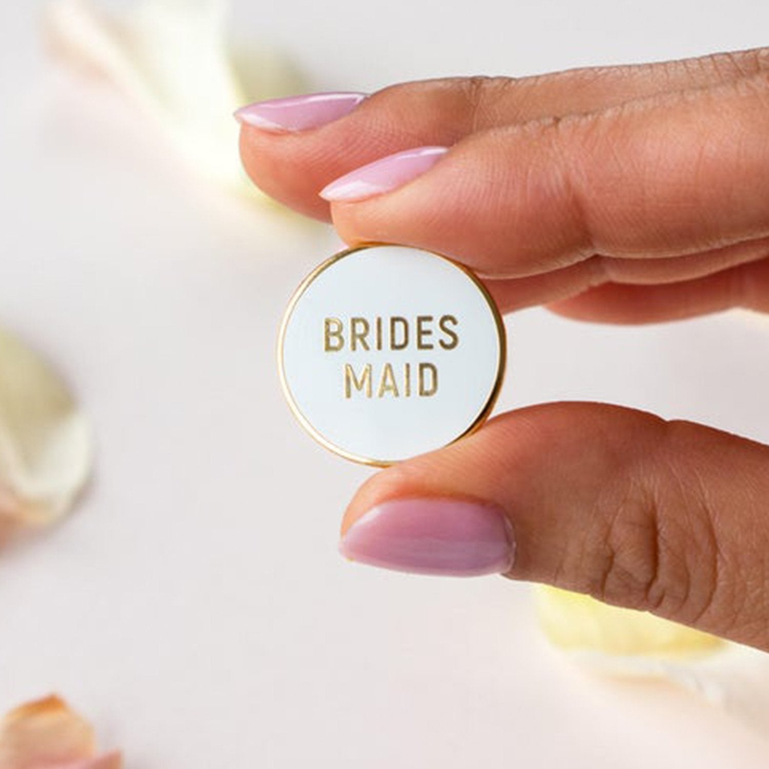 Bridesmaid Enamel Pin in white and gold by Birdy Grey, front view